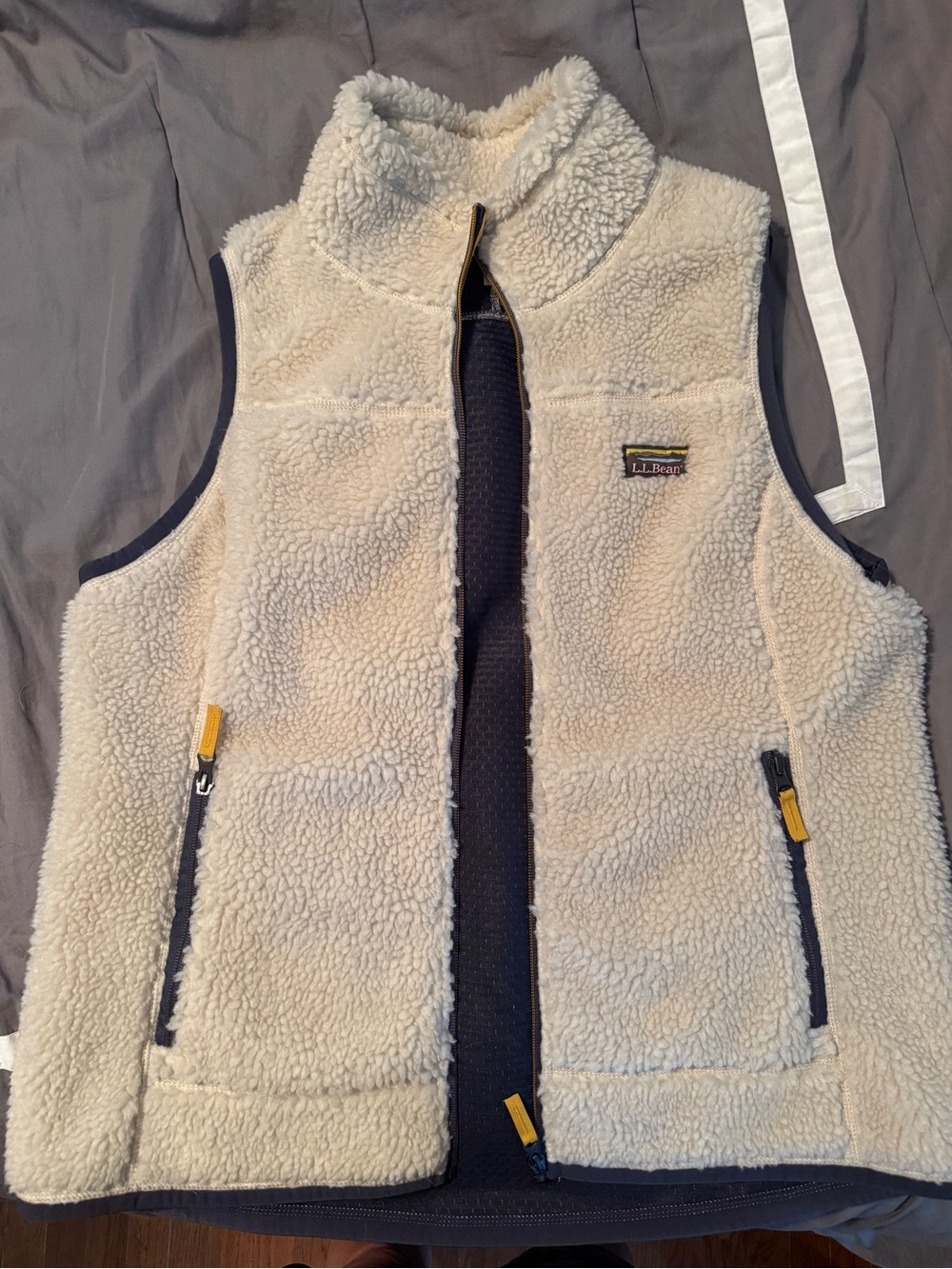 L.L. Bean Cream Sherpa Fleece Vest with Navy Trim and Yellow Zipper Pulls